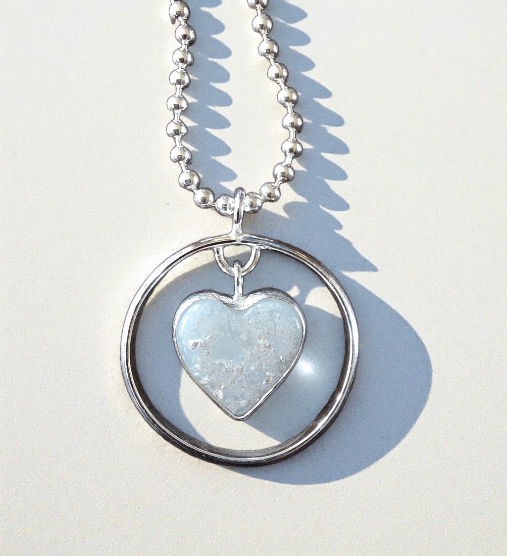 Pair of memorial heart pendants